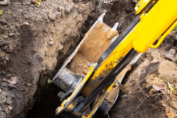Downspout Trenching in Brighton